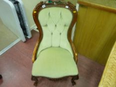 Upholstered button backed spoon chair