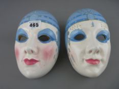Pair of Deco style pottery wall masks