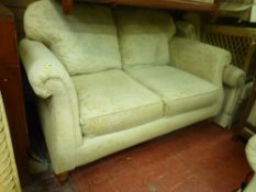Floral upholstered two seater couch