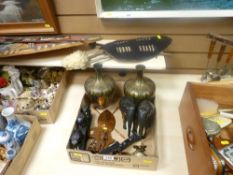 Parcel of ebony elephants, copper African ornamental items, wall hanging spear and shields etc