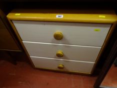 Small light wood chest of three white fronted drawers
