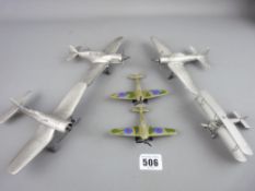 Four polished pewter models of fighter aircraft and two miniature models of Spitfires