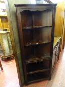 Polished dark wood five shelf corner unit