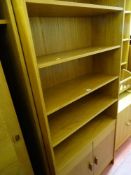 Teak effect bookcase cupboard with five shelves over two lower cupboards