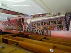 Parcel of three rugs with tassel ends