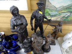 Pair of possibly Russian figures and a quantity of spelter figurines