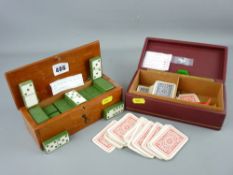 Vintage box of green coloured dominoes and a further box of markers and playing cards