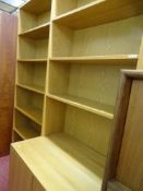Modern light wood effect four shelf bookcase cupboard with two lower cupboard doors and a near