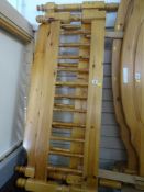 Pair of matching pine headboards with spindle detail