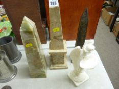 Mineral sphere shaped ornaments and an angel figurine