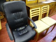 Black upholstered office chair on a swivel base and two light wood dining chairs