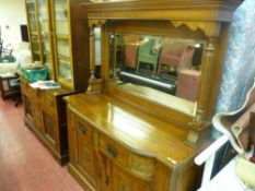 Circa 1900 oak mirrorback sideboard with carved detail