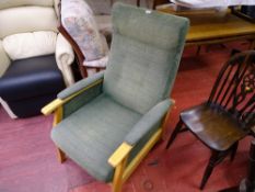 Green modern upholstered armchair