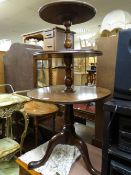 A nice mahogany three-tier dumbwaiter on tripod base