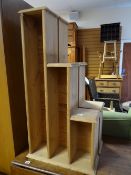 A pair of stripped pine storage / shelving units