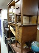 Two vintage office desks together with a two-drawer table