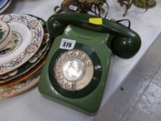 A vintage BT two-piece telephone in green
