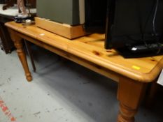 A honey pine kitchen / breakfast table