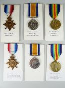 WWI PERIOD MEDALS comprising two trios, one awarded to Corporal A Davies (born Carmarthen, killed in