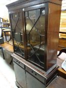 Reproduction mahogany astragal glazed cupboard bookcase