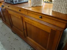 A modern polished wood sideboard by Grange together with a similar serving cupboard
