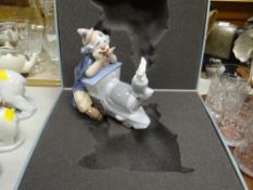 A boxed Lladro Privilege series clown on a train figure