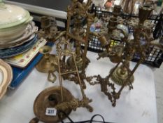 Parcel of brassware including table easels, candelabra & taper sticks