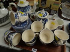 A tray of various blue & white willow pattern teaware