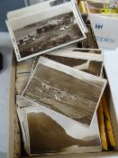 A box containing photographs & postcards etc