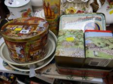 A collection of vintage storage tins