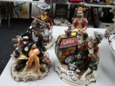 A group of four large Capodimonte figurines including 'The Organ Grinder' & 'A Drunk on a Bench'