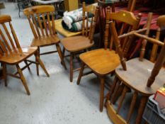 A set of seven pine kitchen chairs