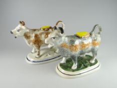 A good pair of Staffordshire pottery sponge ware cow creamers