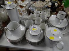 A Thomas white & silver gilt decorated coffee set