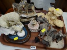 A tray of various resin animal figures including elephants, polar bears etc
