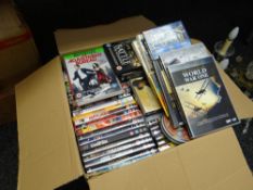 Box of various DVDs