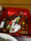 A collection of various ceramic & wooden bowl smoker's pipes