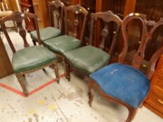 Set of four dining chairs with green leather effect seats together with another