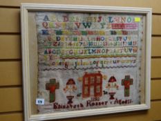 A framed sampler by Elizabeth Rosser, aged 13, dated 1892
