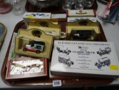 A collection of boxed diecast vehicles