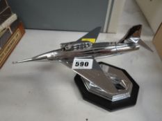 A desk table lighter in the form of a jet plane