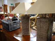 A parcel of various ceramic & wicker effect table lamps together with a bamboo effect standard lamp