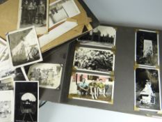 Two volumes of postcards of military interest including Hitler, Mussolini, Churchill together with a