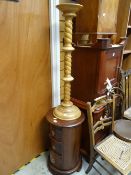 A small round mahogany three-drawer cabinet together with a turned wood plant stand