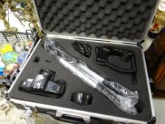 A cased Tamashi camera with tripod & equipment
