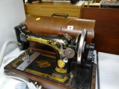 A cased Singer sewing machine