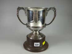 A silver sporting trophy inscribed 'The Lee Golf Club, North Devon Captain's Cup 1931' on a base