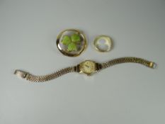A gold wedding band, engraved decoration together with a ladies wristwatch & brooch, (watch & ring
