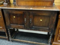 A vintage oak cased gramophone on barley-twist legs