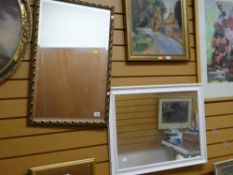 A gilt framed hall mirror together with another in a white painted frame